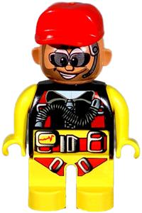 Duplo Figure, Male Action Wheeler, Yellow Legs, Yellow Top with Yellow/Black/Red Parachute, Red Cap, Beard, Sunglasses and Headphone 4555pb091