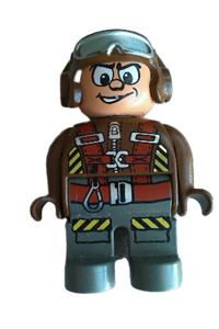 Duplo Figure, Male Action Wheeler, Dark Gray Legs, Brown Top with Parachute Straps, Brown Helmet with Goggles 4555pb153