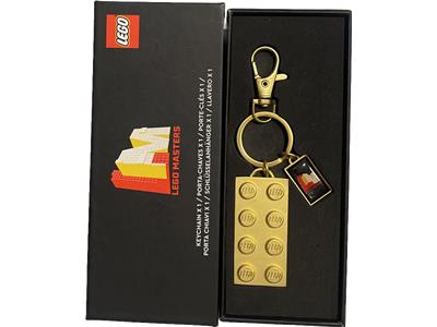 SDCC 2023 LEGO Masters 2x4 Gold Metal Keychain thumbnail image